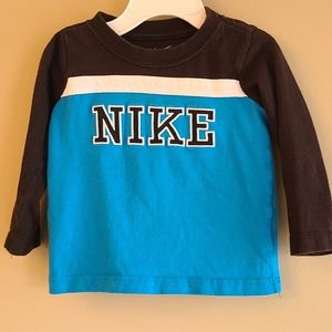 NIKE blue and black long sleeved tee shirt